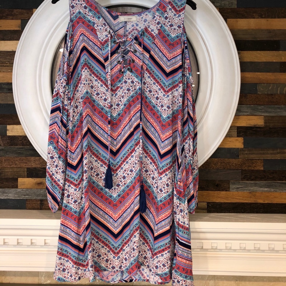 Long sleeve cold shoulder dress.